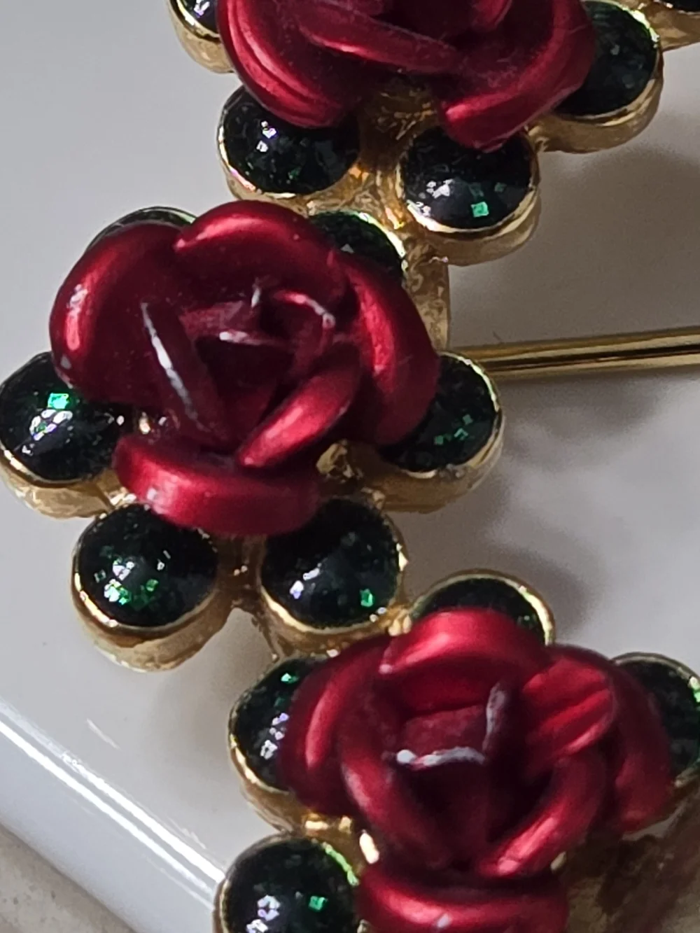 Avon Gold Bow Wreath Brooch with Red Roses and Green Accents